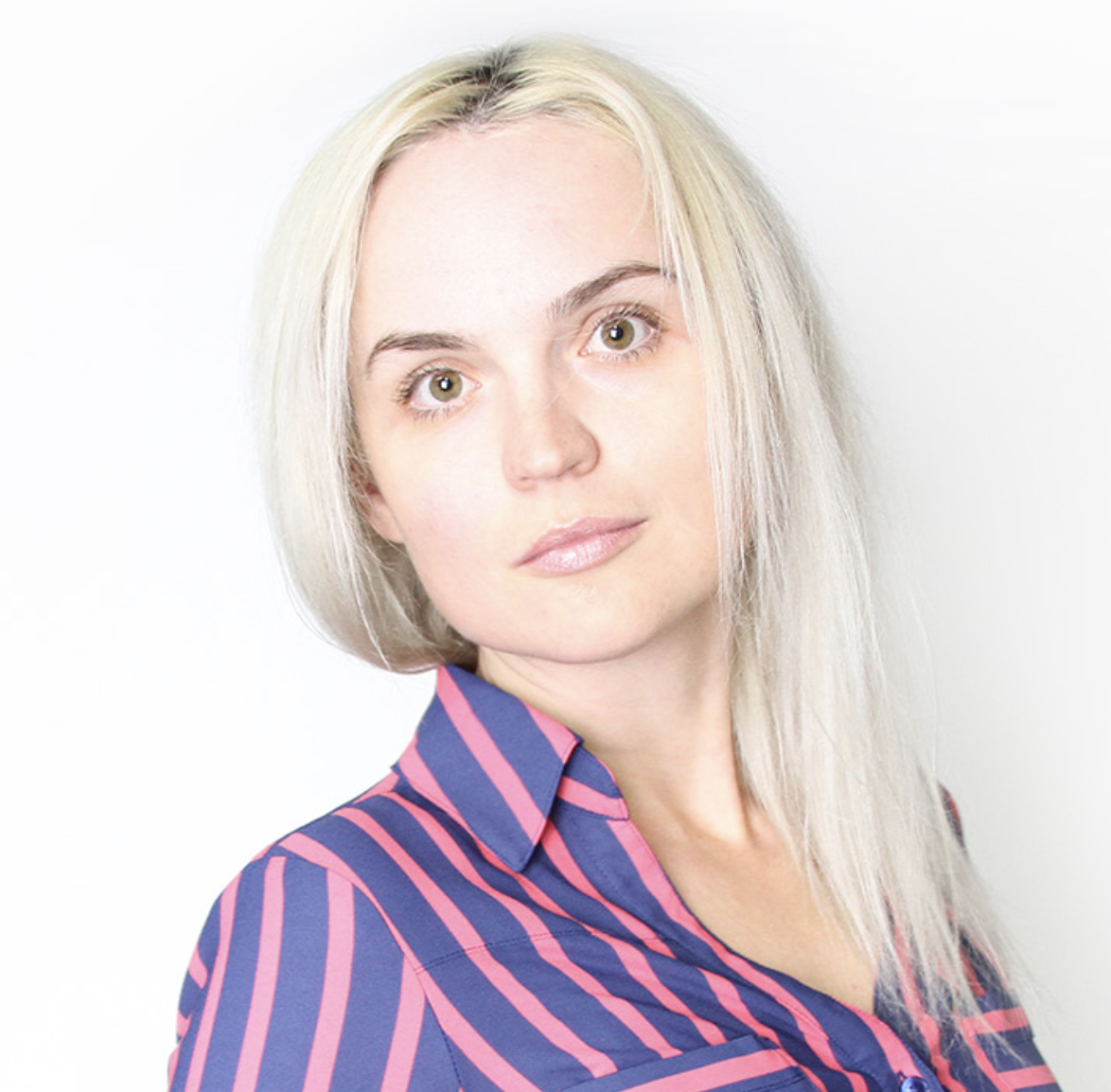 Headshot of a woman with blonde hair